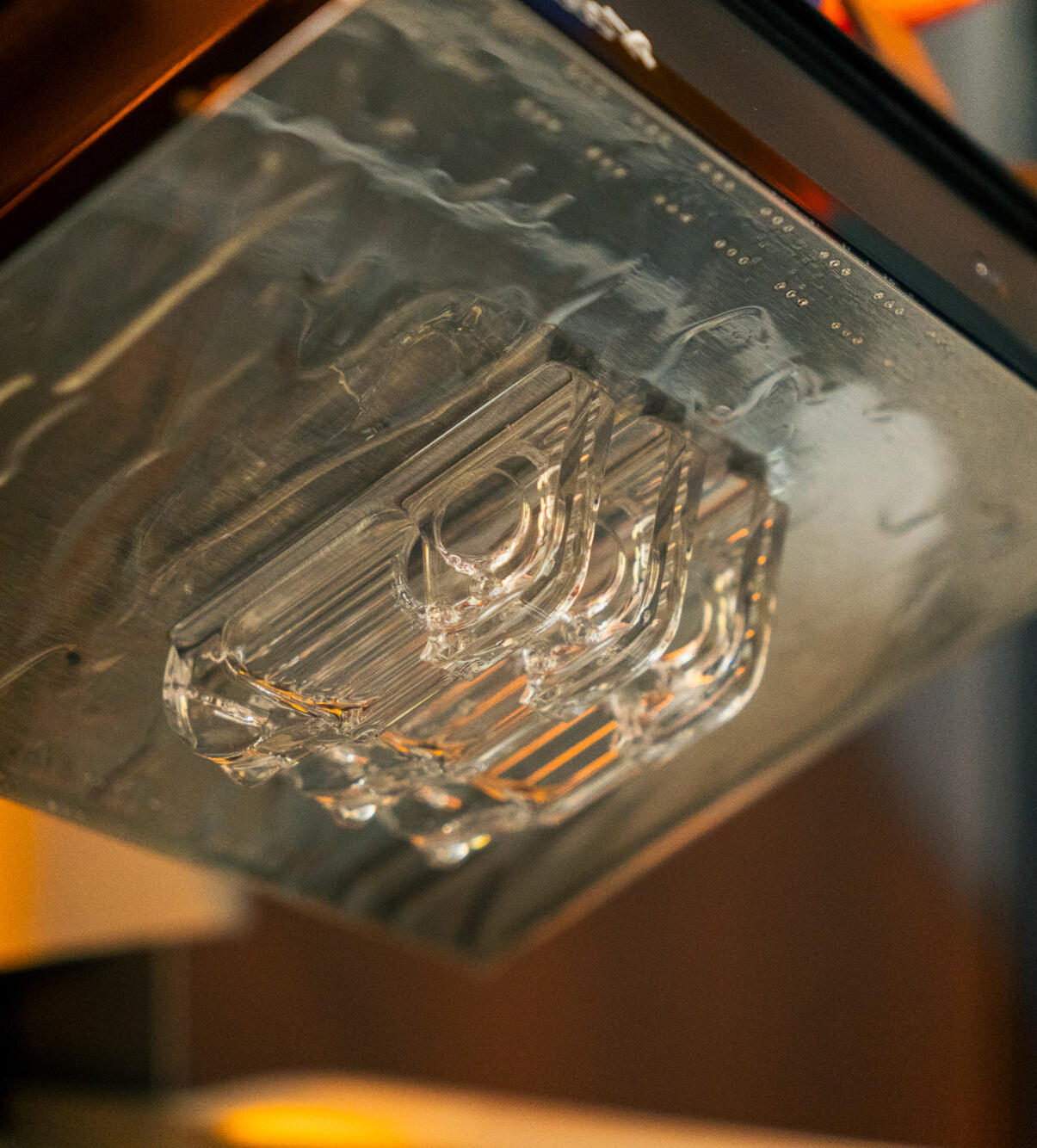 Multiple Clicky Cutter coming out of a 3D printer.